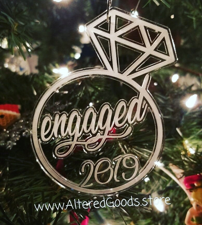 Engaged diamond ring and year ornament