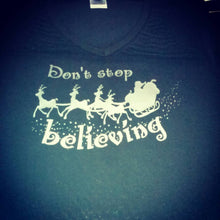 Load image into Gallery viewer, Don&#39;t stop believing Santa clause shirt.
