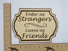 Load image into Gallery viewer, Enter as strangers leave as friends wooden sign - Altered Goods
