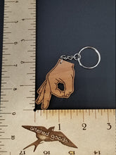 Load image into Gallery viewer, Circle game hand wood keychain - Altered Goods
