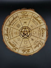 Load image into Gallery viewer, Wheel of the year laser engraved tree slice - Altered Goods
