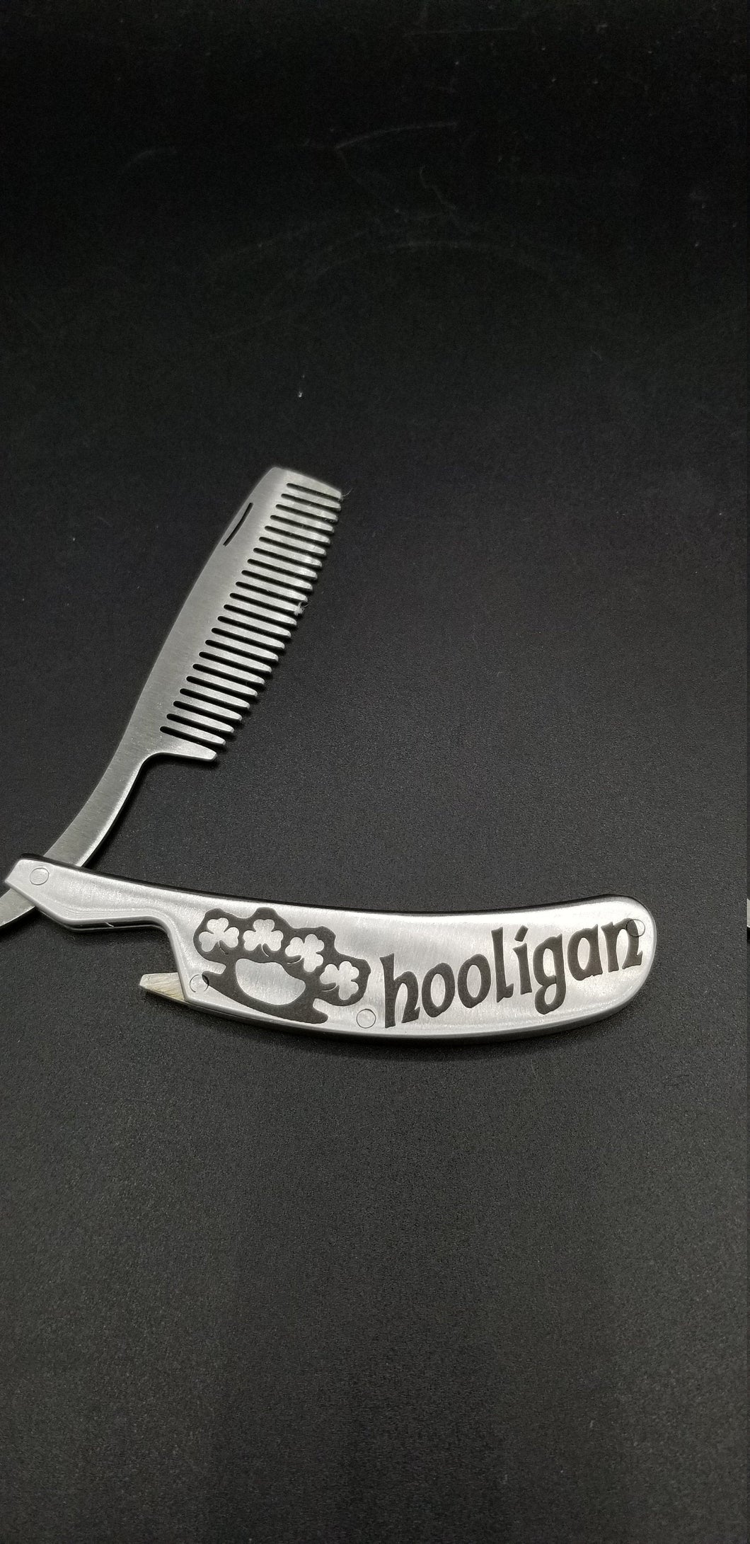 Hooligan shamrock brass knuckle metal folding beard comb and bottle open - Altered Goods