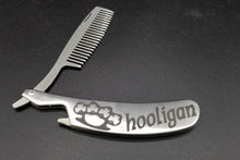 Load image into Gallery viewer, Hooligan shamrock brass knuckle metal folding beard comb and bottle open - Altered Goods
