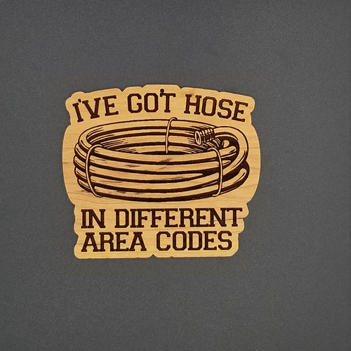 I've got hose in different area codes cherry hardwood santa ornament