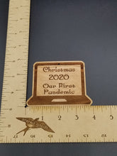 Load image into Gallery viewer, Christmas 2020 our first pandemic laptop hardwood engraved ornament
