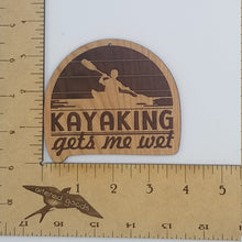 Load image into Gallery viewer, kayaking gets me wet laser engraved cherry wood christmas ornament
