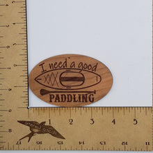 Load image into Gallery viewer, I need a good paddling padddleboard laser engraved cherry wood christmas ornament
