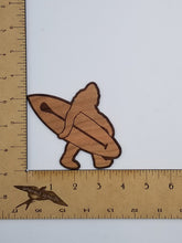 Load image into Gallery viewer, Stand up padddleboard bigfoot laser engraved cherry wood christmas ornament
