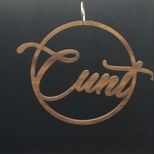 Cunt ornament walnut