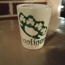 Load image into Gallery viewer, Hooligan brass knuckle shamrock shot glass - Altered Goods
